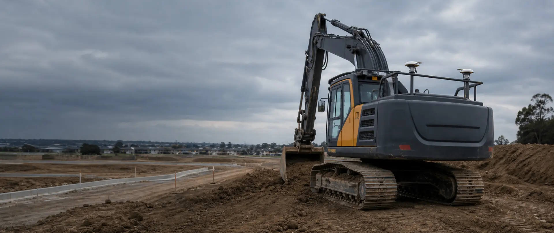 Excavator using dual GNSS machine control on a civil construction site
